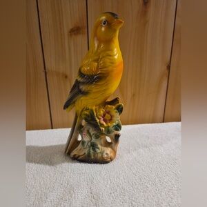 vintage ceramic figurine of a yellow canary